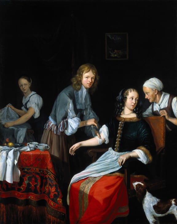 A surgeon binding up a woman's arm after bloodletting. Oil painting by Jacob Toorenvliet, 1666.