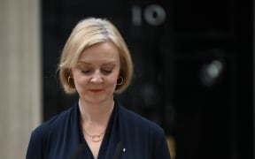 Britain's Prime Minister Liz Truss reacts as she delivers a speech outside of 10 Downing Street in central London on October 20, 2022 to announce her resignation. - British Prime Minister Liz Truss announced her resignation on after just six weeks in office that looked like a descent into hell, triggering a new internal election within the Conservative Party. (Photo by Daniel LEAL / AFP)