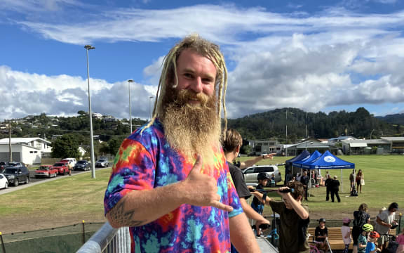 Skateboarder Drew Rees throws a shaka at the opening of Tairua Skate Park 15 April 2024.