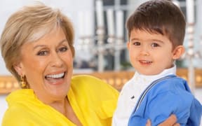 Dame Kiri Te Kanawa with her grandson Luther.