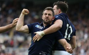 Scotland captain Greig Laidlaw celebrates his match-winning try, flanked by Tommy Seymour (L) and Matt Scott (R) late in the game against Samoa, Rugby World Cup, St James' Park, Newcastle 10 October 2015
***PLEASE CREDIT: FOTOSPORT/DAVID GIBSON***