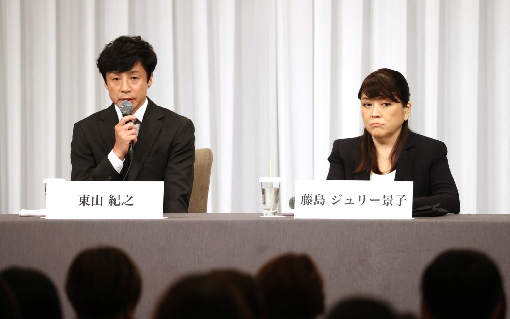 Noriyuki Higashiyama (L), a new president, and Julie Keiko  Fujishima, President of Johnny and Associates Inc.  attend a press conference in Chiyoda Ward, Tokyo on September 7, 2023. Johnny Kitagawa (John Hiromu Kitagawa / Hiromu Kitagawa) was the founder and president of Johnny & Associates, a production agency for numerous popular boy idle singers and groups in Japan. Johnny Kitagawa has been the subject of many claims that he had taken advantage of his position to engage in improper sexual relationships with boys under contract to his talent agency. Fujishima Julie Keiko will take responsibility and resign as president, and actor Higashiyama will cease his activities from next year onwards to concentrate on his job as president. Julie K. Fujishima appeared in public for the first time. ( The Yomiuri Shimbun ) (Photo by Kaname Yoneyama / Yomiuri / The Yomiuri Shimbun via AFP)