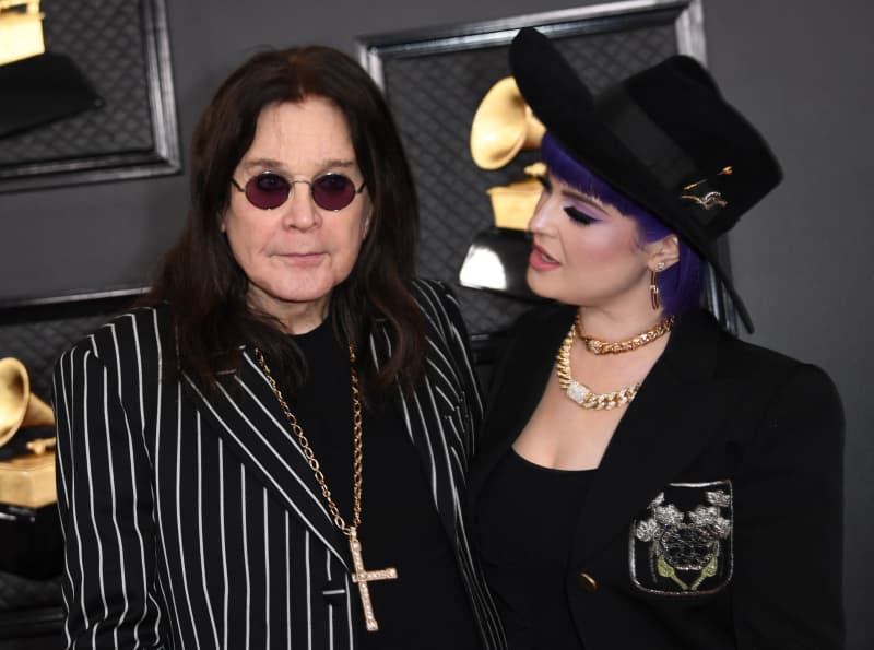 British singer-songwriter Ozzy Osbourne and his daughter Kelly Osbourne arrive for the 62nd Annual Grammy Awards on January 26, 2020, in Los Angeles. (Photo by VALERIE MACON / AFP)
