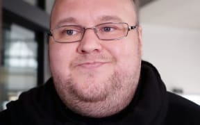Kim Dotcom outside the Auckland District Court.