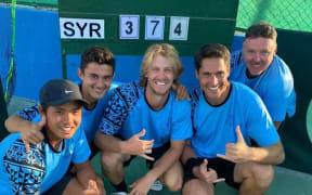 Pacific Oceania celebrate winning promotion from Asia Oceania Group Three.