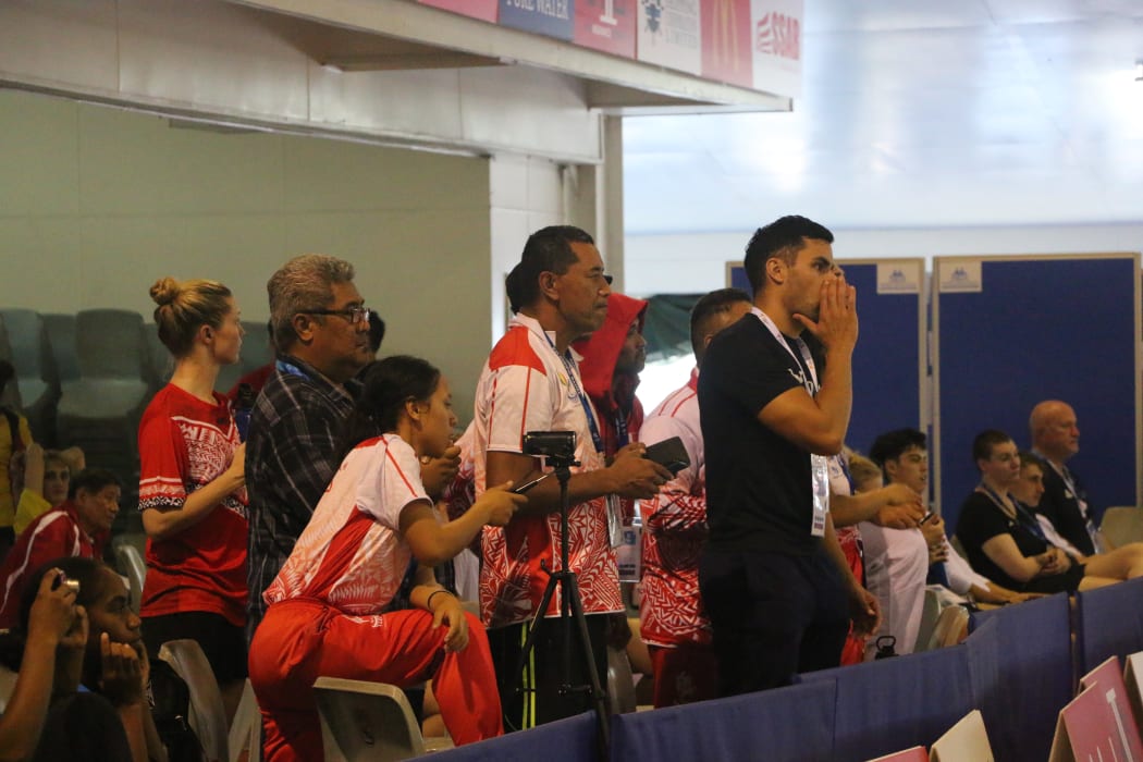 Pita Taufatofua and the rest of Team Tonga show their support.