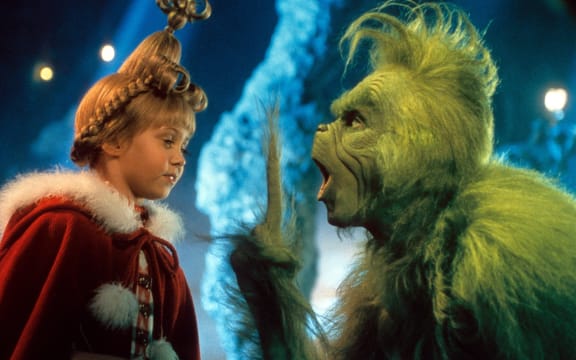 How the Grinch Stole Christmas (2000), directed by Ron Howard, starring Jim Carrey as the Grinch and Taylor Momsen as Cindy Lou Who.