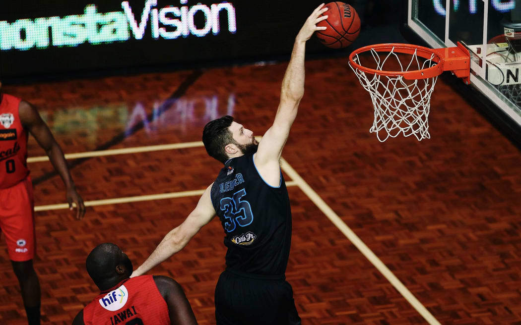 Alex Pledger of the Breakers with a dunk down the lane during the ANBL Grand Final game against the Perth Wildcats.