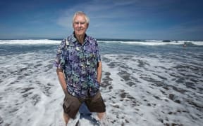 Sir Bob Harvey at Karekare Beach