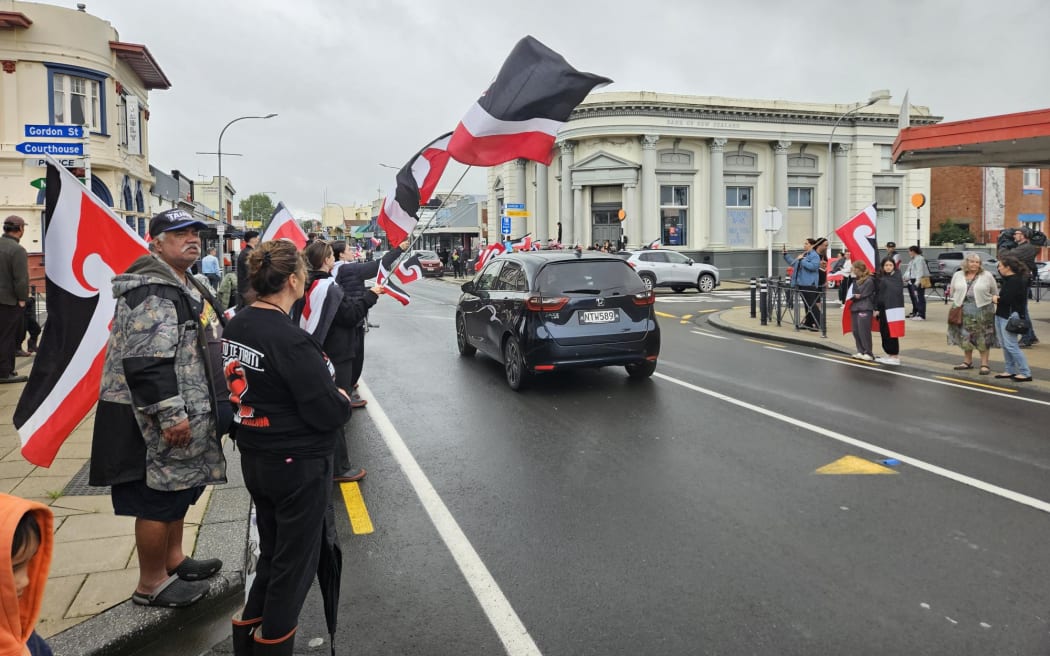 Protestors march through Dannevirke during day 6 of Hīkoi mō te Tiriti.