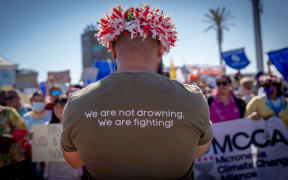 Pacific youth climate activist at a demonstration at COP27. 13 November 2022