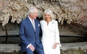 In this handout picture taken and released by Buckingham Palace on April 07, 2025, King Charles III and Queen Camilla pose for a portrait at Villa Wolkonsky in Rome, Italy. Ahead of the 20th Wedding Anniversary of Their Majesties, King Charles III and Queen Camilla on Wednesday 9th April 2025, Buckingham Palace is issuing a photograph of them taken today by Chris Jackson at Villa Wolkonsky, in Rome. The photograph was taken on the first day of Their Majesties four day State Visit to the Holy See and The Republic of Italy. (Photo by Chris Jackson / BUCKINGHAM PALACE / AFP) / NO USE AFTER APRIL 20, 2025 22:00:00 GMT - NO USE AFTER APRIL 20, 2025 22:00:00 GMT - XGTY / RESTRICTED TO EDITORIAL USE - MANDATORY CREDIT "AFP PHOTO / CHRIS JACKSON/GETTY IMAGES FOR BUCKINGHAM PALACE" - NO MERCHANDISING NO MARKETING NO ADVERTISING CAMPAIGNS - DISTRIBUTED AS A SERVICE TO CLIENTS /