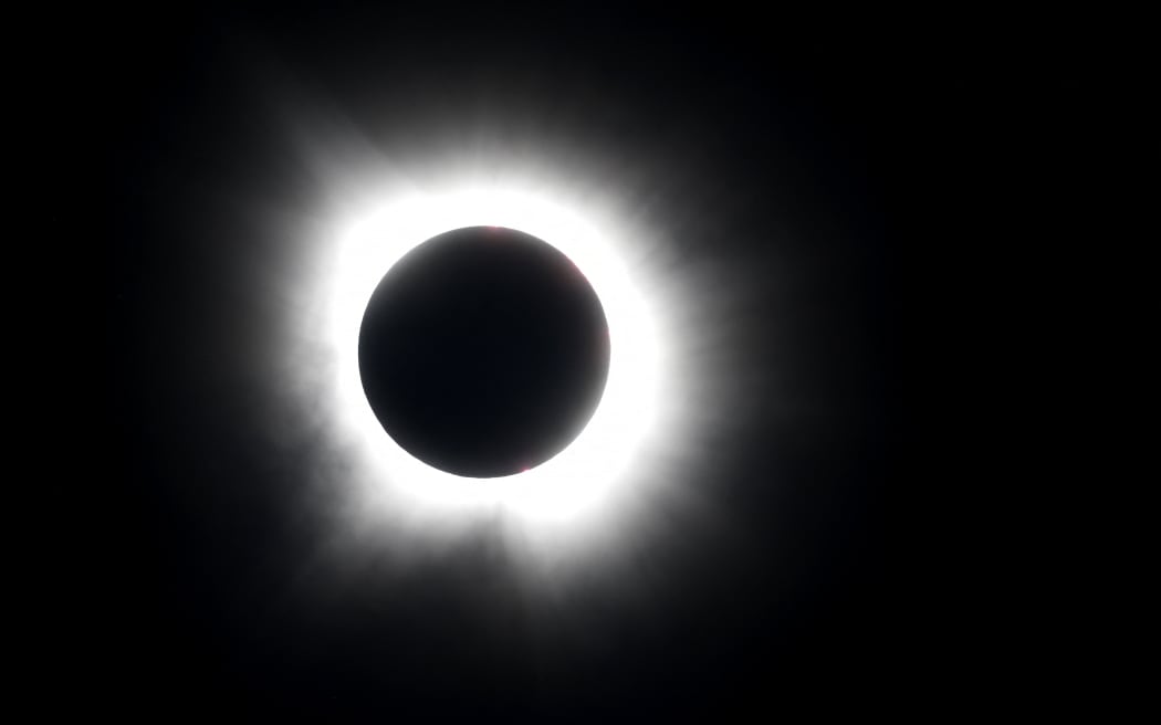 The moon eclipses the sun on April 8, 2024 in Fort Worth, Texas.