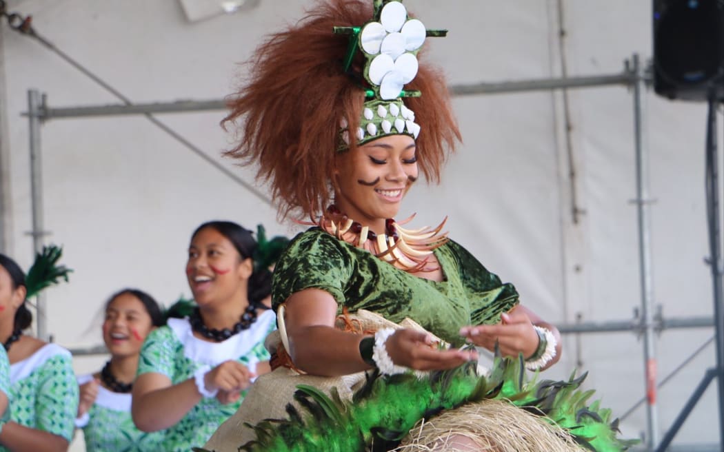 A member of the Marcellin College Samoan group takes to the stage on day four at Polyfest 2021.