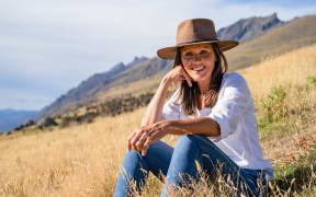 Marijke Dunselman sitting in a paddock