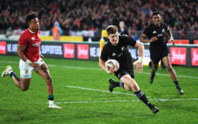 Jordie Barrett goes in for his try.