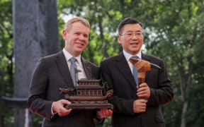 Prime Minister Chris Hipkins visited Baoshan International Folk Art Museum while in Shanghai, China on 29 June, 2023. The PM and Baoshan district mayor Gao Yiyi exchange gifts.