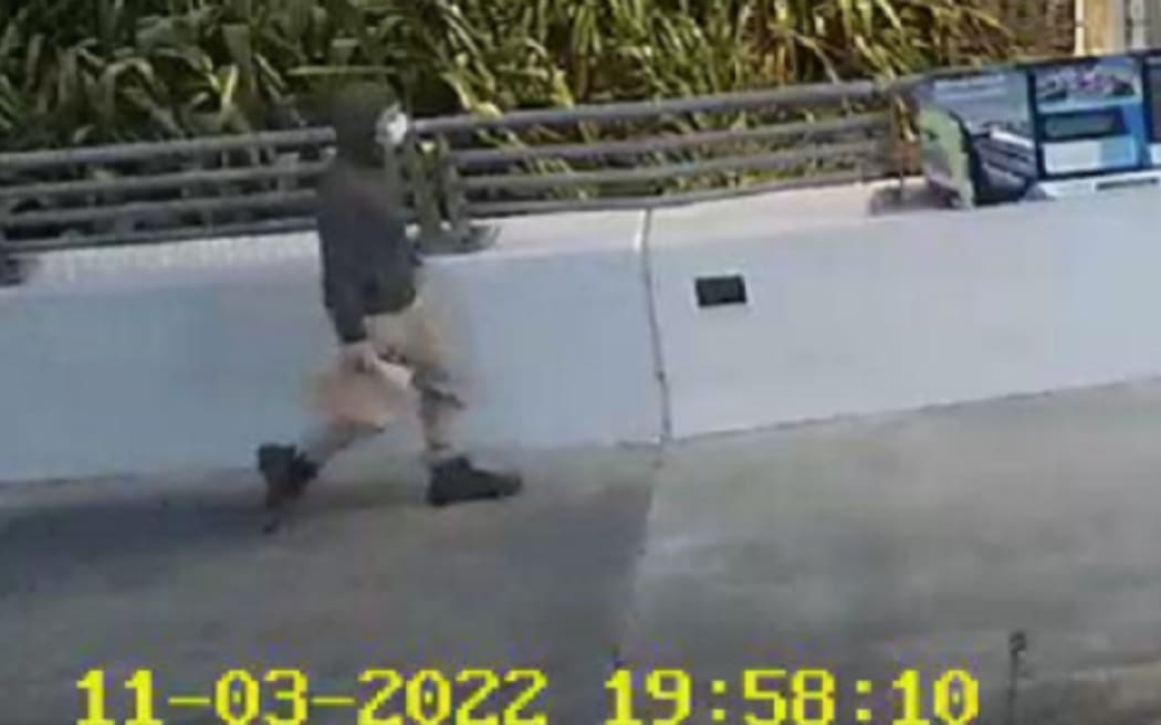 A man walking alone across the Sandhurst Drive overbridge onto Truman Lane is believed to be David Holland, who went missing one year ago.