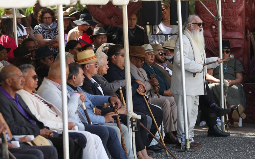 Ngāpuhi Rangatira Matua Hone Sadler speaks as a delegation including representatives from Kīngitanga, Rātana, Parihaka and Te Pāti Māori are welcomed on to Te Whare Rūnanga at the Treaty grounds, on 4 February, 2024.