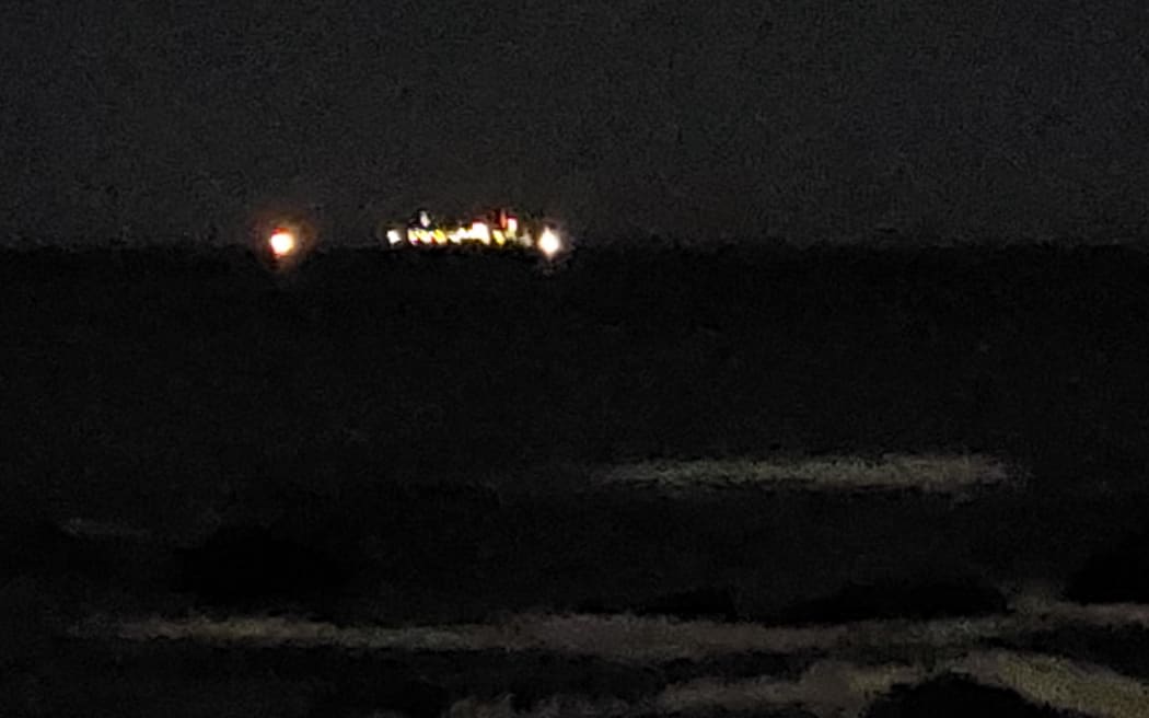 The lights of the stricken Connemara can be seen off Wellington's south coast.