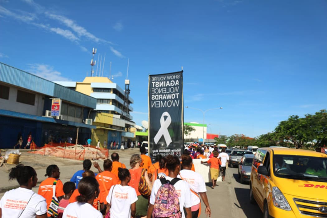 Solomon Islanders mark White Ribbon Day in Honiara on Friday 25th November, 2016. This year was the first time local businesses joined the march in support of ending violence against women.