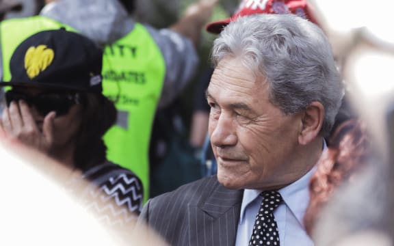 Winston Peters talks to protesters outside Parliament on 22 February 2022.