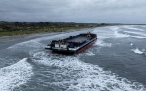 The Manahau barge, stranded at Westport's Carters Beach was successfully refloated on 6 September 2024.