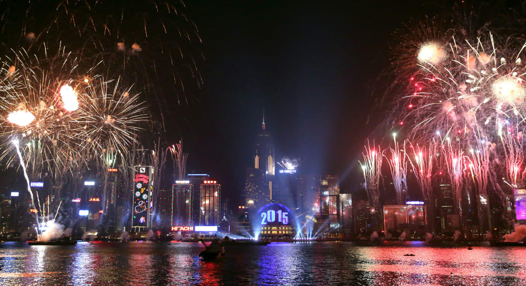 Fireworks explode over Victoria Harbour in Hong Kong.