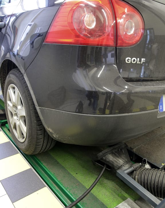 A Volkswagen 'Golf V' series deisel vehicle being given an emissions inspection, Hamburg, Germany, 23 September 2015.