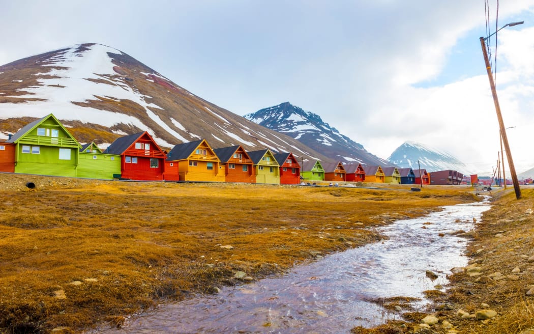 Colorful wooden houses at Longyearbyen in Svalbard, during an arctic summer.