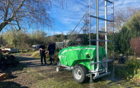 Electric foliage sprayer used by Forest Lodge Orchard near Cromwell