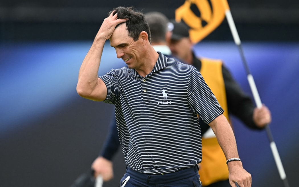 US golfer Billy Horschel reacts after finishing his third round on the 18th green, on day three of the 152nd British Open Golf Championship at Royal Troon on the south west coast of Scotland on July 20, 2024. (Photo by Paul ELLIS / AFP) / RESTRICTED TO EDITORIAL USE