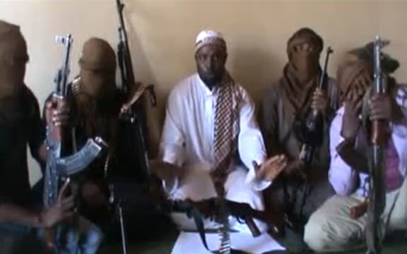 A video posted online  in 2012 was said to show Boko Haram leader Abubakar Shekau (centre).