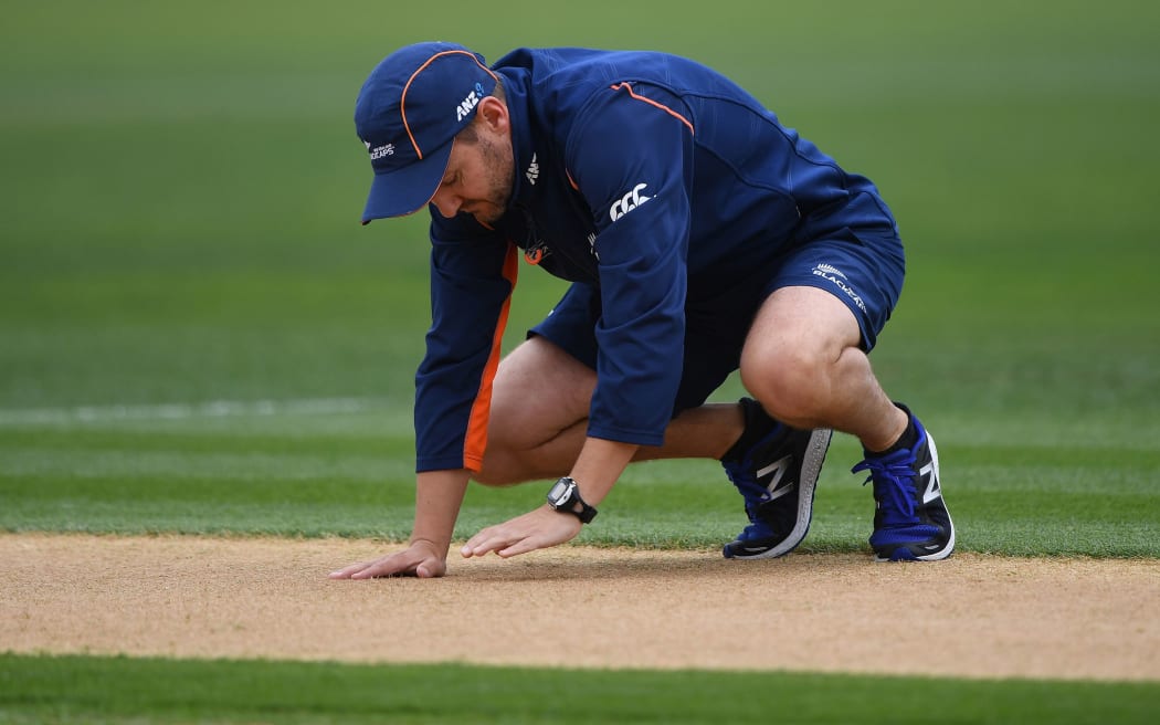 Coach Mike Hesson inspects the wicket during a rain delay. International One Day Cricket. New Zealand Black Caps v Australia. Chappell–Hadlee Trophy, Game 2. McLean Park, Napier, New Zealand. 2 February 2017