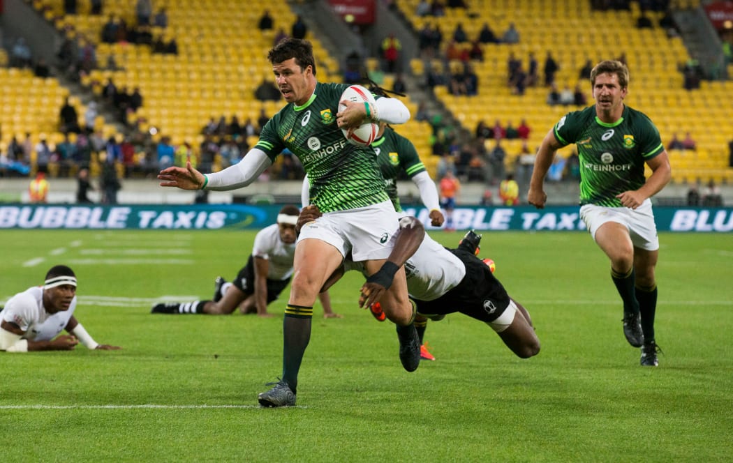 South Africa’s Ruhan Nel on his way to a try in the Wellington Sevens final against Fiji.