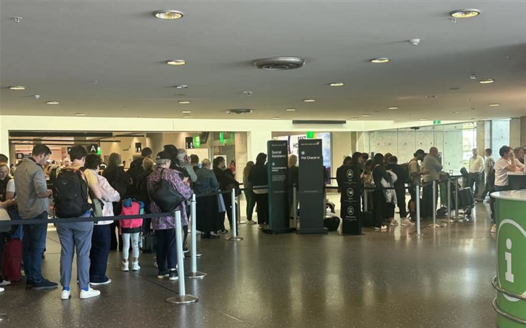 People waiting at Christchurch Airport after the weather causes mass cancelations.