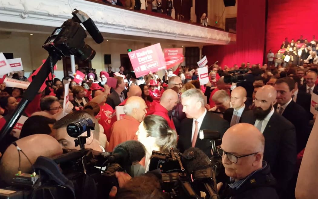 Labour leader Jacinda Ardern and her deputy Kelvin Davis exit the stage at the campaign launch.
