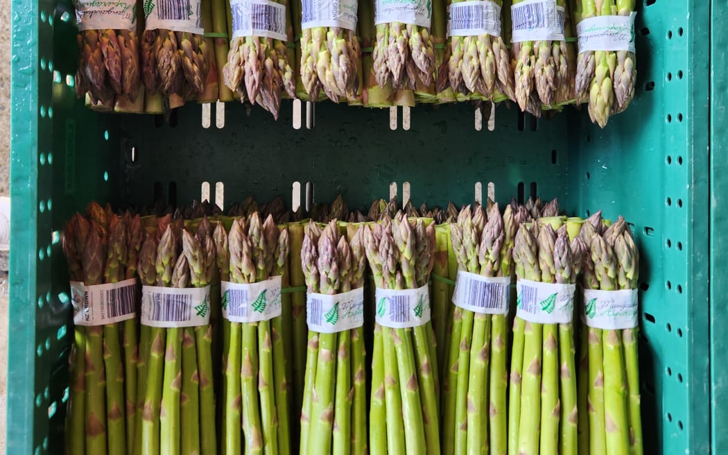 The workers ensure each bundle is taped neatly as presentation is key