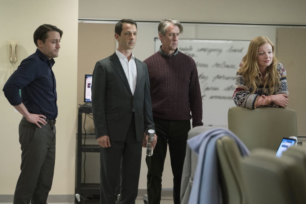 Roman (Kieran Culkin), Kendall (Jeremy Strong), Conor (Alan Ruck) and Shiv (Sarah Snook) at the foot of Logan's hospital bed after his stroke.