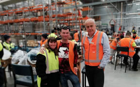 Martin Wylie with workers in the Altus Enterprises factory in Papatoetoe