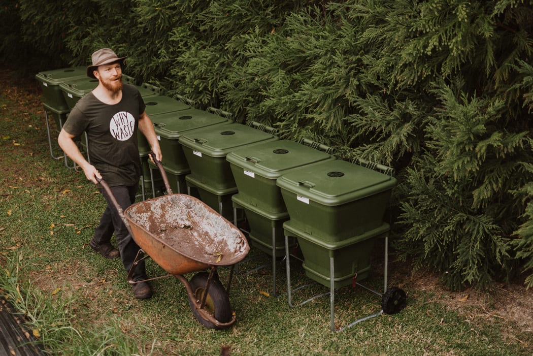 Why Waste founder Leo Murray with some of the worm farms that are available on subscription.