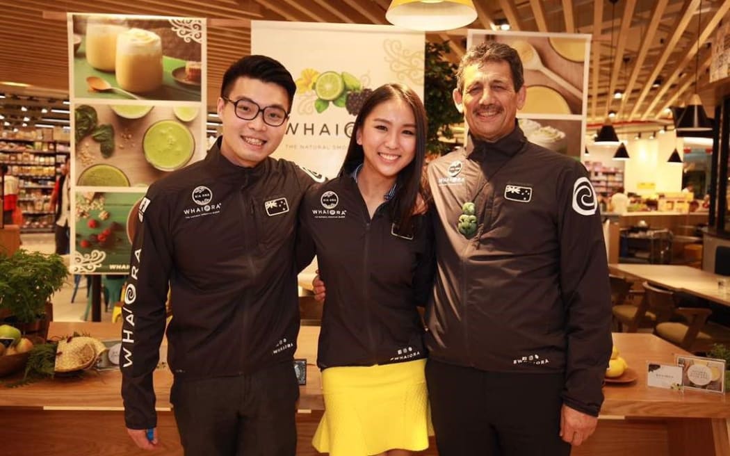 Brother and sister Brian and Chemmy Tam with Miraka chairman Kingi Smiler.