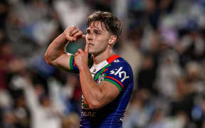 Luke Metcalf of the Warriors celebrates his try against Manly.