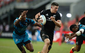 All Black Sevens player Sam Dickson in action against Fiji in Singapore final 2022.