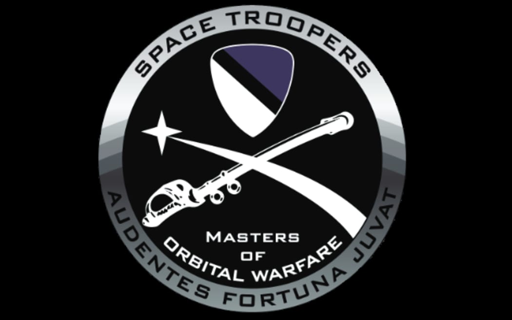 The Space Troopers badge features the Latin phrase "Audentes fortuna juvat" - "Fortune favours the bold".