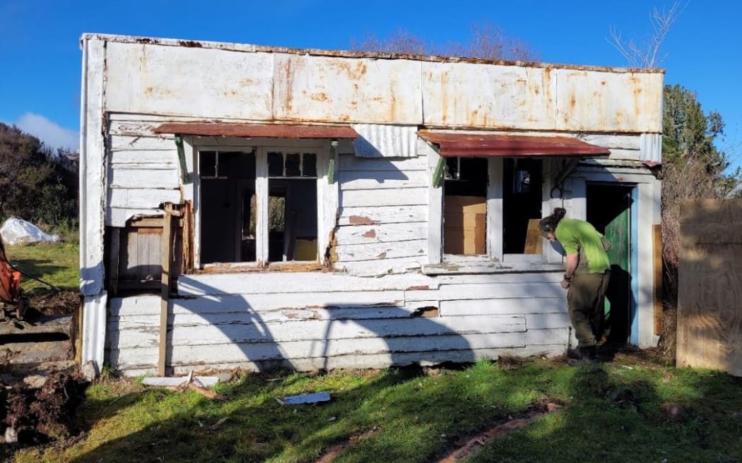 The Jos Divis cottage as it appeared when DOC began its work, in July 2022.