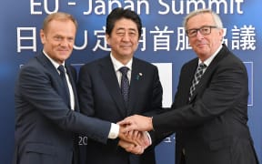 (L-R) European Council President Donald Tusk, Japanese Prime Minister Shinzo Abe, and European Commision President Jean-Claude Juncker.