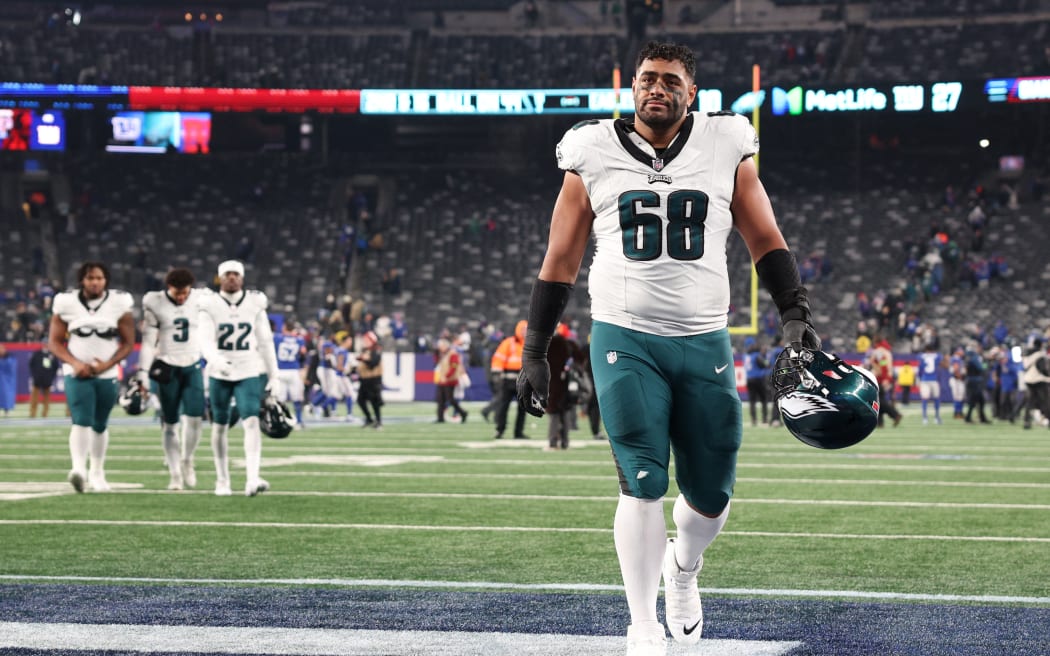 Jordan Mailata  walks off the field after a loss to the New York Giants at MetLife Stadium on January 07, 2024 in East Rutherford, New Jersey.   Elsa/Getty Images/AFP (Photo by ELSA / GETTY IMAGES NORTH AMERICA / Getty Images via AFP)