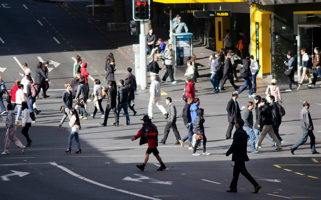 AUCKLAND, NZ - MAY 29:Traffic on Queen street on May 29 2013.It's a major commercial thoroughfare in the Auckland CBD, New Zealand's main population center.