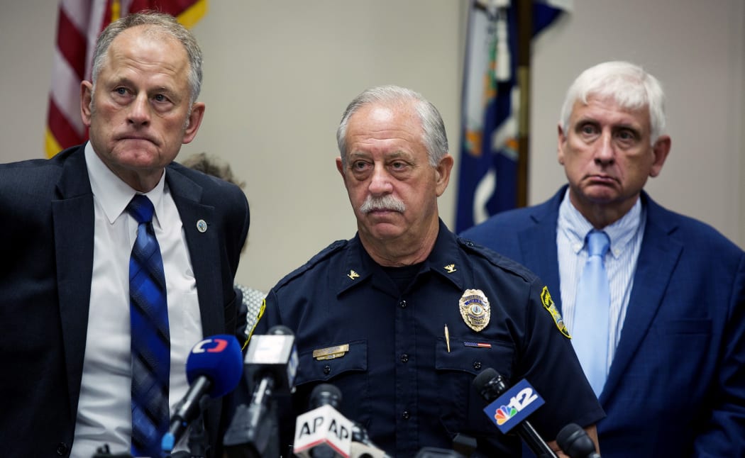 Virginia Beach City Manager Dave Hansen, left, Chief of Police James Cervera, center, and Mayor Bobby Dyer listen during a news conference Saturday, June 1, 2019 in Virginia Beach, Va.